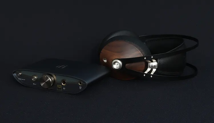 iFi audio ZEN DAC 3 beside Meze Audio 99 Classics headphones